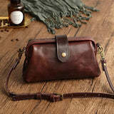Herdis | Klassische und kompakte Tasche in warmem Cognac-Ton