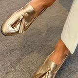 GOLDENE MOKASSINS MIT QUASTEN