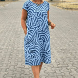 Nelia™ – Stilvolles Bedrucktes Sommerkleid