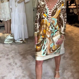 Moonie - Kleid mit Sonnenstrahlen-Druck