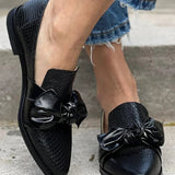 SCHWARZE LOAFERS MIT GLÄNZENDEM BOW