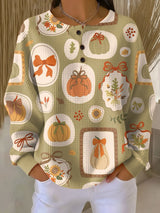 Freja | Herbstpullover mit Schleifen und Kürbissen