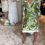 Moonie - Kleid mit Sonnenstrahlen-Druck
