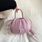 Kåra | Elegante Faltenhandtasche in Puderrosa