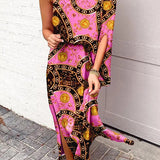 Rosie Maxikleid mit einem Schulterdesign und bedrucktem Saum