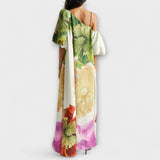 Blumiges Maxikleid mit asymmetrischem Design