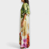 Blumiges Maxikleid mit asymmetrischem Design