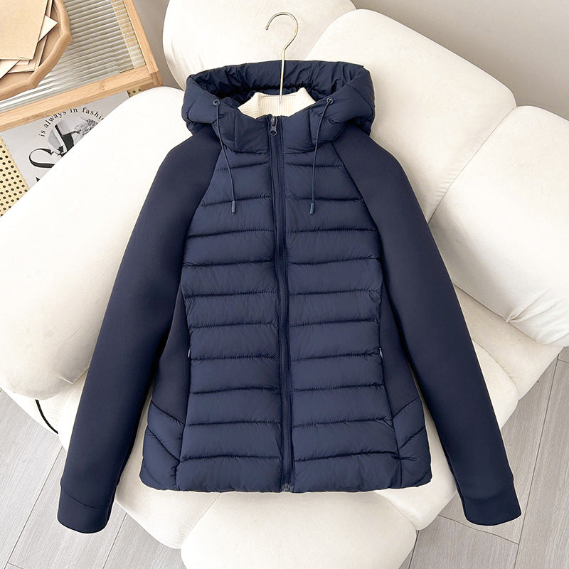 Damen leichte Hybrid-Steppjacke mit Kapuze und elastischen Ärmelpaneelen