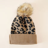 Damen Strickmütze mit Leopardenmuster und Kunstfell-Pompon