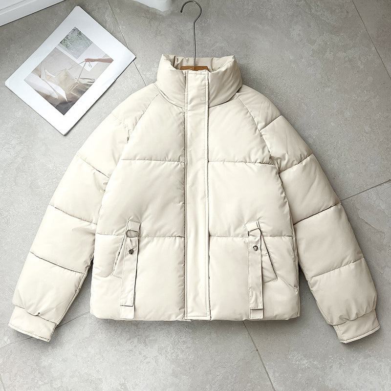 Damen kurze gesteppte Pufferjacke mit hohem Stehkragen und D-Ring-Tasche