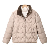 Damen kurze gesteppte Pufferjacke mit Bogensteppung und Druckknopfblende