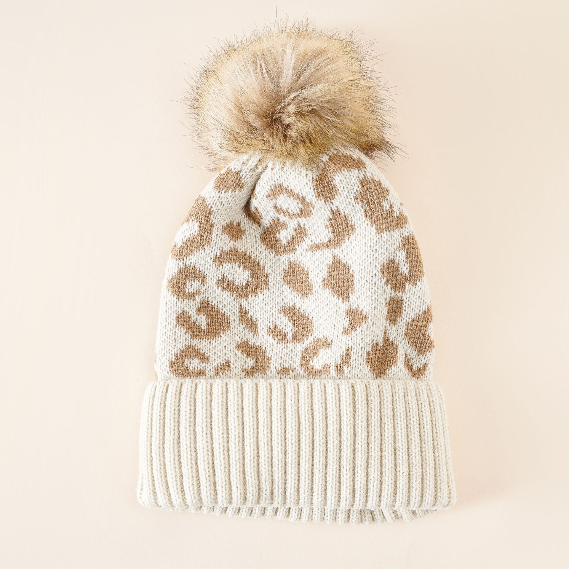 Damen Strickmütze mit Leopardenmuster und Kunstfell-Pompon
