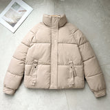 Damen kurze gesteppte Pufferjacke mit hohem Stehkragen und D-Ring-Tasche