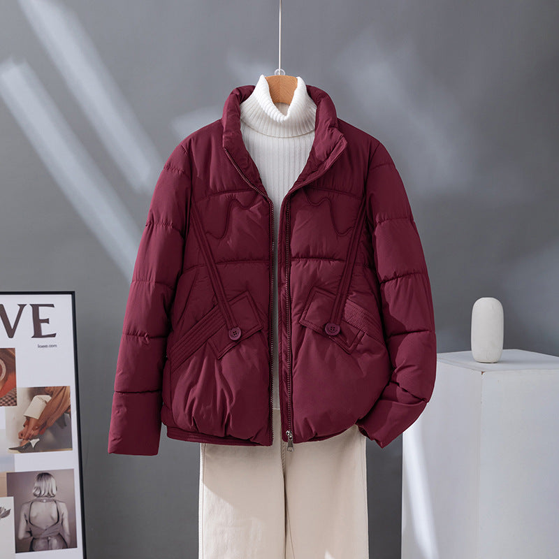 Damen kurzer Steppblouson mit hoher Kragenblende und Pattentaschen