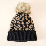 Damen Strickmütze mit Leopardenmuster und Kunstfell-Pompon