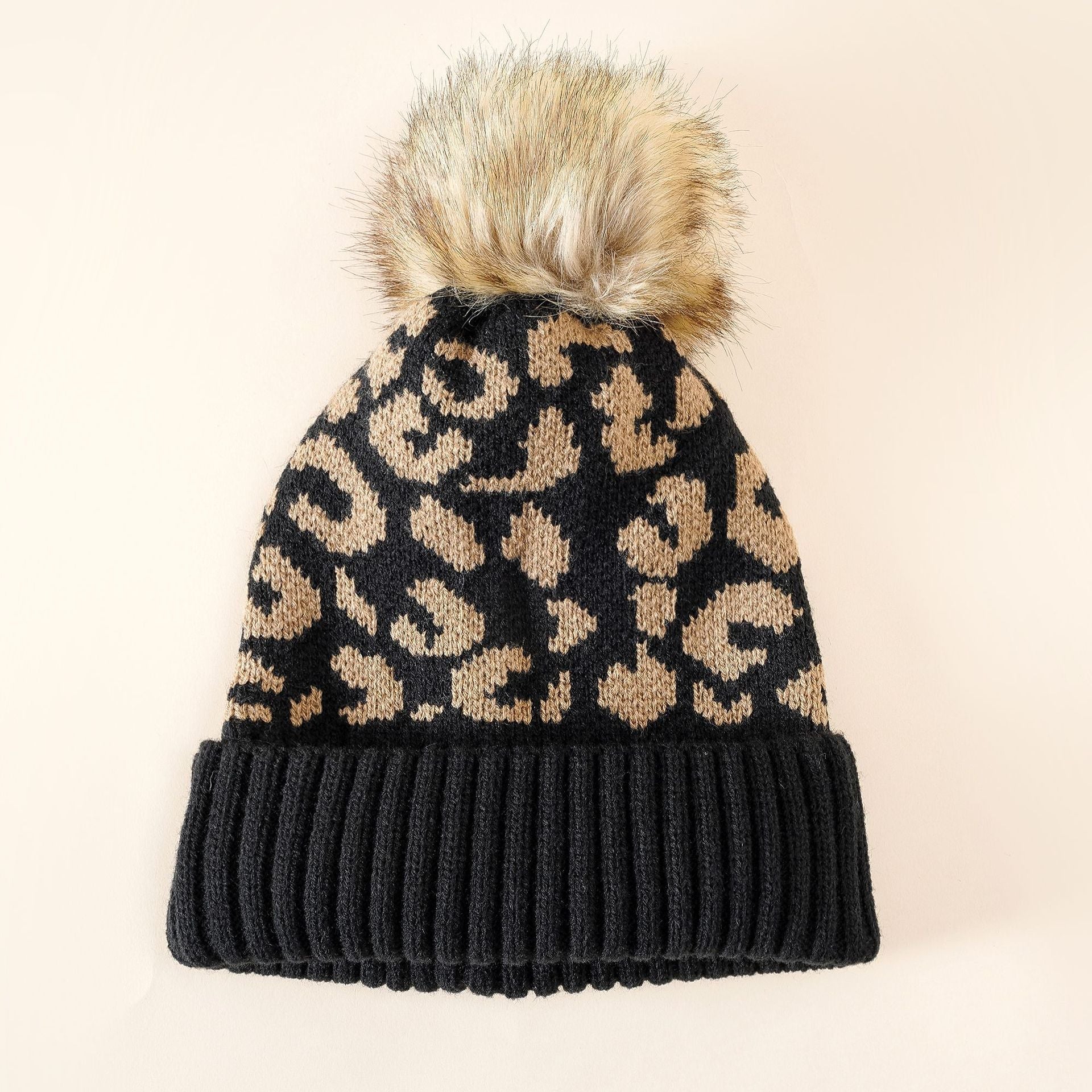 Damen Strickmütze mit Leopardenmuster und Kunstfell-Pompon