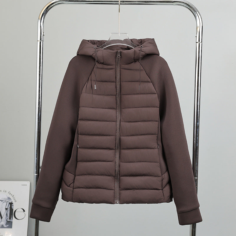 Damen leichte Hybrid-Steppjacke mit Kapuze und elastischen Ärmelpaneelen