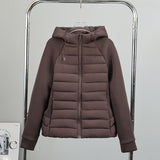 Damen leichte Hybrid-Steppjacke mit Kapuze und elastischen Ärmelpaneelen