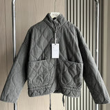 Damen Cropped Steppjacke mit Taschen und Bindegürtel