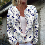 Birgit | Wit-blauwe trui met bloemen & vogels
