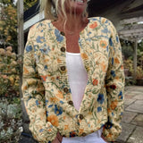 Cornelia | Crème-kleurige vest met bloemenpatroon