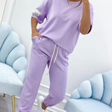 Damen Relaxed Outfit: Set aus solidem Oberteil und Hose