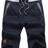 Eden | Knie-lange Shorts mit Kordelzug und Taschen