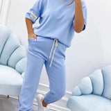 Damen Relaxed Outfit: Set aus solidem Oberteil und Hose