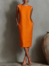 Orangefarbenes Etuikleid für Damen mit ärmellosem Rundhalsausschnitt und Seitentaschen, zeitlos minimalistisch-eleganter Stil