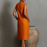 Orangefarbenes Etuikleid für Damen mit ärmellosem Rundhalsausschnitt und Seitentaschen, zeitlos minimalistisch-eleganter Stil